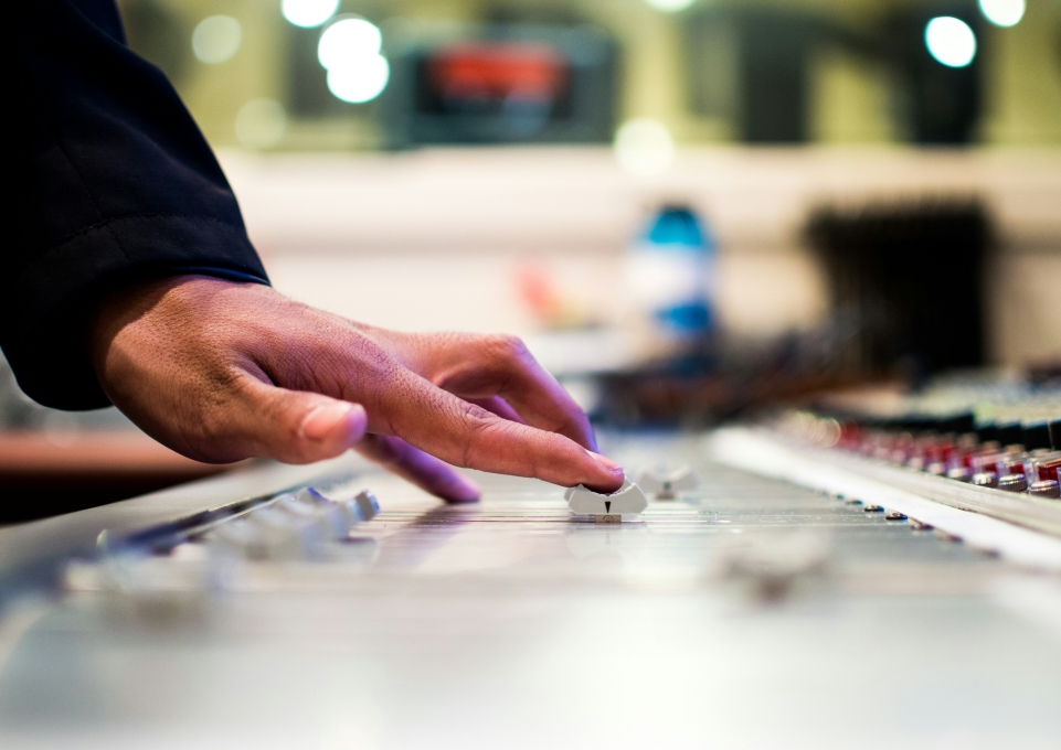 Person using a music mixer